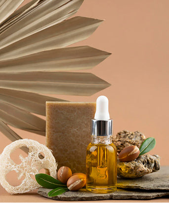 Pristine Forests ingredients: argan oil, soap bar, dried palm frond and argan nuts
